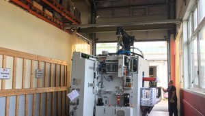 lathe in it's way to hall 3 - mass production of gear wheels